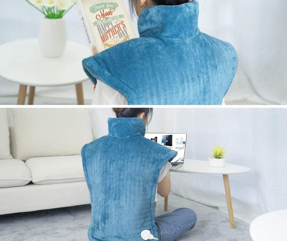 Woman using RENPHO electric heating pad over shoulders and back, demonstrating full coverage and weighted design for comfort.